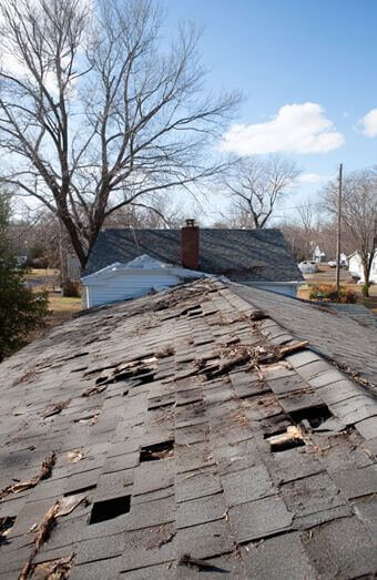 Storm Damage Roof Repair X
